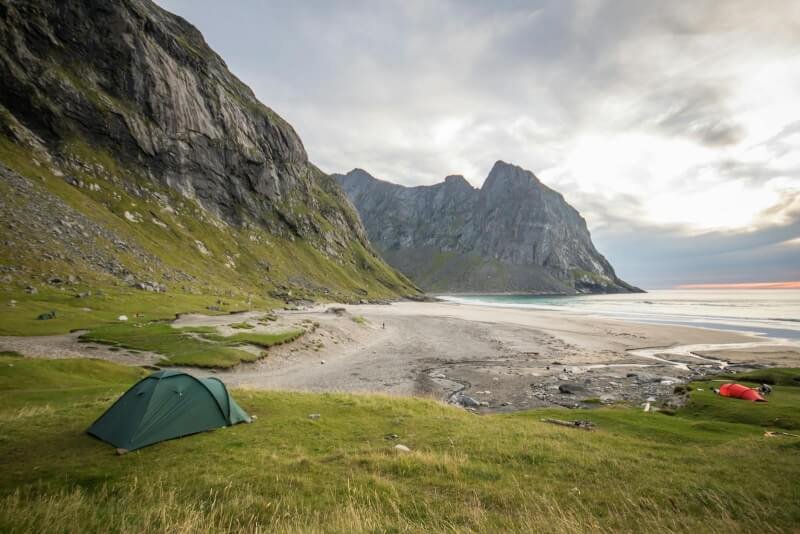 Green Tent on Green Grass Field Facing Ocean